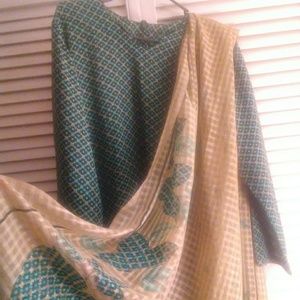 Teal green salwar kameez.